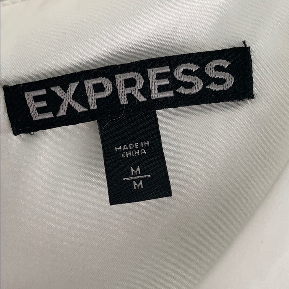 Express Peplum Top - Picture 2 of 3